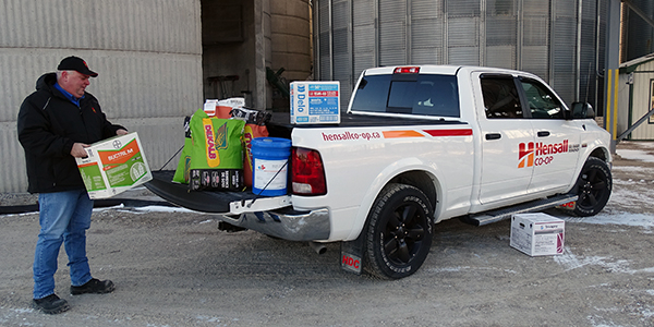 Individual loading crop protection products into truck bed